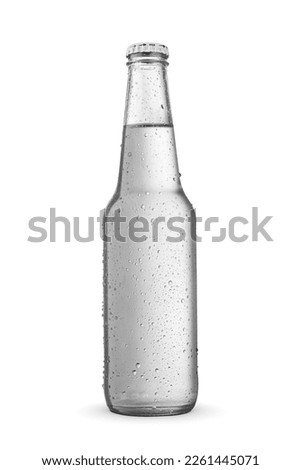 Wet glass transparent bottle of pure water without label isolated on a white background Royalty-Free Stock Photo #2261445071