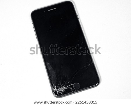 Broken Black Phone on White Background 