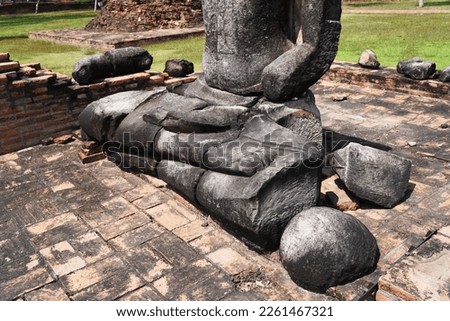 Ancient buddha broken and flooring  base redbrick in Ayutthaya  province