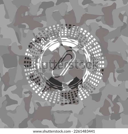 paper clip icon on grey camo pattern. 