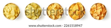 Set or collection of different flavor potato chips or crisps in bowls isolated on white background, top view Royalty-Free Stock Photo #2261518947