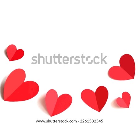 Red paper hearts isolated on a white background. Happy Valentines day backdrop. Holiday card or greeting card template. Symbol of love. Copy space.