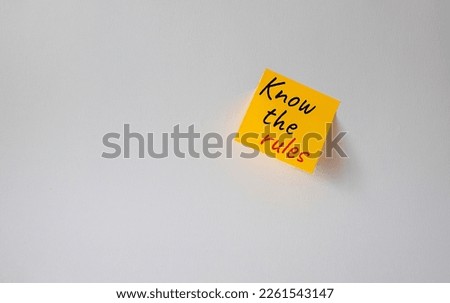 Know the rules symbol. Concept words Know the rules om orange steaky note. Beautiful white background. Business and Know the rules concept. Copy space.