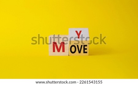 My Move symbol. Turned wooden cubes with words My Move. Beautiful yellow background. Business and My Move concept. Copy space