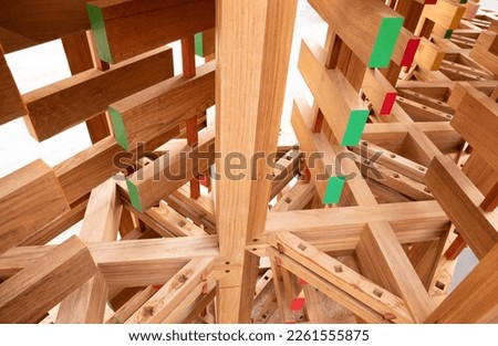 Wood joints detail with wooden dowel joints.Construction details with teak wood, joints between elements. Royalty-Free Stock Photo #2261555875