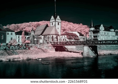 small church in a german town next to a bridge and a river
infrared photography