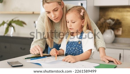 Education, mother and learning child writing or drawing for kindergarten school homework or project in a house. Support, development and mama helping or working with a smart and creative girl student Royalty-Free Stock Photo #2261589499