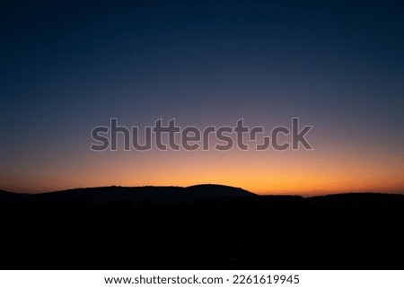 Beautiful sunset. Night sky and the sun has already set Royalty-Free Stock Photo #2261619945