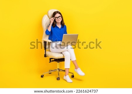 Full body size photo of young pretty business lady wear smart casual outfit laptop touch glasses promo vacancy isolated on yellow color background Royalty-Free Stock Photo #2261624737