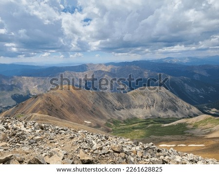 Hiking the a Colorado 14er mountain in the Spring time. 