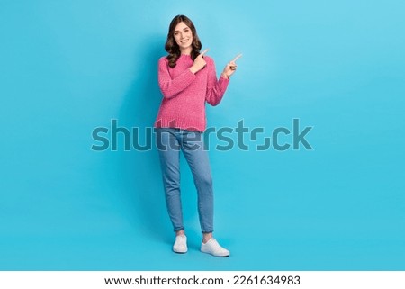 Full body size cadre of young business lady wear knit sweater denim jeans brand clothes direct fingers mockup isolated on blue color background