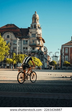 Bike Riding in Libertatii Square, Timisoara Royalty-Free Stock Photo #2261636887