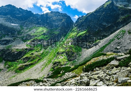 View on mountain pass (Wrota Chalubinskiego or Vrata Chalubinskeho) in Tatras. Beautiful mountain landscape in Tatra Mountain. Royalty-Free Stock Photo #2261668625