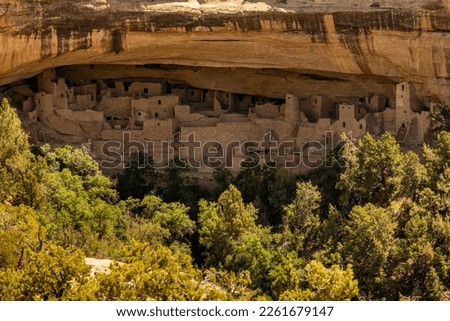 Spruce Tree House Tucked Under Canyon Cliff In Mesa Verde National Park Royalty-Free Stock Photo #2261679147