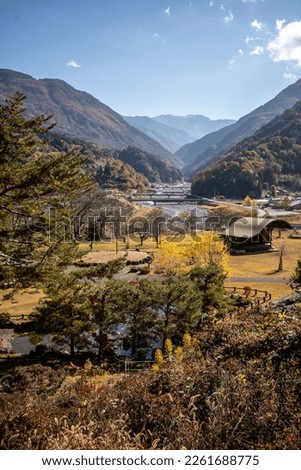 View of Oshika village in the Japanese alps, Nagano. mountain layers, fields over river Royalty-Free Stock Photo #2261688775
