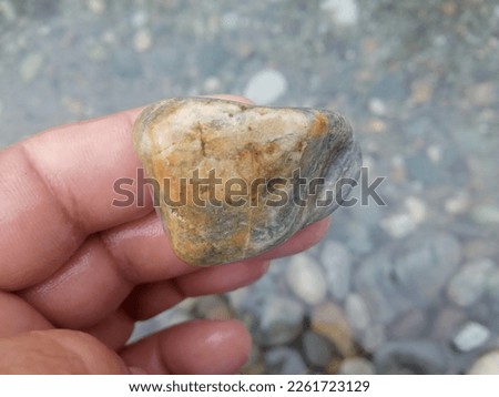 Amazing natural design with colorful stone images with high resolution caption found in riverside.