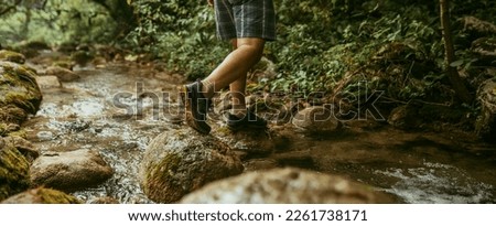 mens footsteps in rhe forest Royalty-Free Stock Photo #2261738171