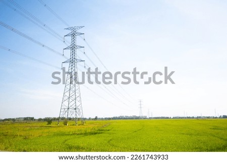 high voltage pole supply electricity to areas outside the city Royalty-Free Stock Photo #2261743933