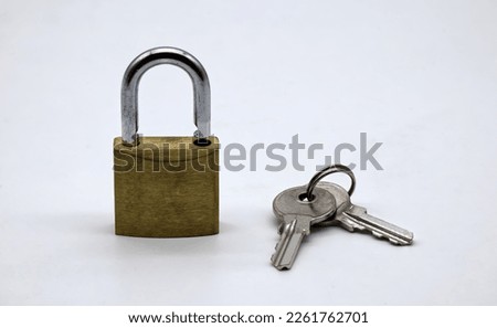 Padlock with keys isolated on white background