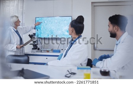 Presentation, science and scientist speaker in the laboratory meeting, training or seminar. Innovation, leadership and senior female researcher presenting discovery to her team with technology in lab Royalty-Free Stock Photo #2261771851