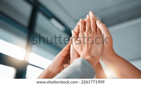 Hands, team and high five for collaboration, trust or unity in coordination or corporate goals at the office. Hands of group in teamwork celebration for partnership, agreement or community support Royalty-Free Stock Photo #2261771909