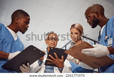 Tablet, teamwork and group of doctors in hospital management, results and medical data with manager. Nurse, professional healthcare people and technology of clinic review, planning or problem solving