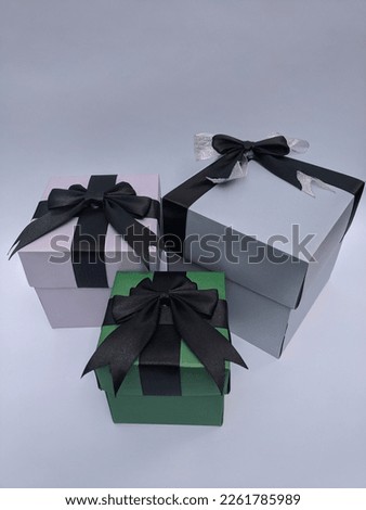 soft green, silver and purple gift box with ribbon decoration