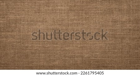 beige linen background, fabric texture for fashion design or upholstered furniture Royalty-Free Stock Photo #2261795405