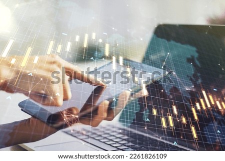Double exposure of abstract creative financial chart with world map and with finger clicks on a digital tablet on background, research and strategy concept