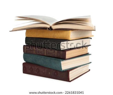 Stack of many old hardcover books isolated on white Royalty-Free Stock Photo #2261831041