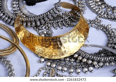 Indian Traditional jewellery displayed in a street shop for sale in Pune, Maharashtra. Indian art, Indian artificial Designer jewelry. Royalty-Free Stock Photo #2261832473