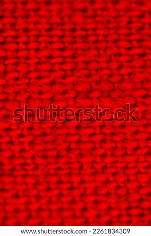 red textile background macro fiber