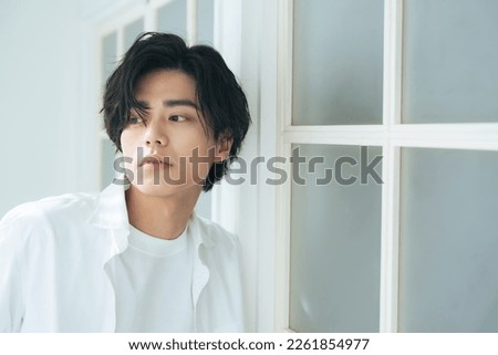 Portrait of young Asian man. Men's beauty concept. Men's cosmetics. Royalty-Free Stock Photo #2261854977