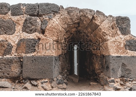 loophole in an ancient crusader fortress Royalty-Free Stock Photo #2261867843