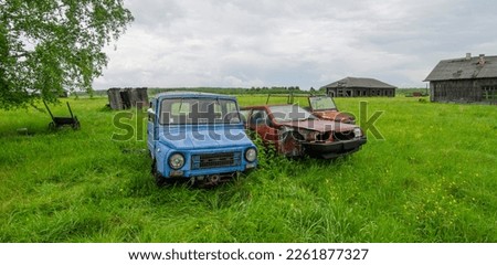 Abandoned Soviet cars on the outskirts of the village of Yeremino. Russia. Sverdlovsk region.