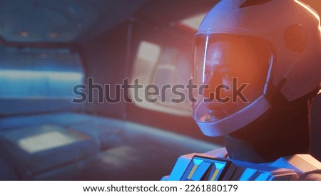 A woman astronaut in a space suit aboard the orbital station. A young female cosmonaut pilots a spaceship. Galactic travel and science concept. Royalty-Free Stock Photo #2261880179