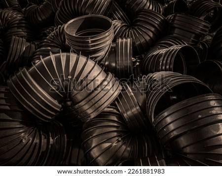 Abstract photography of black plastic pipes