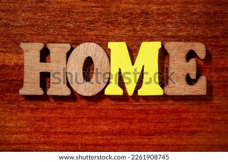 Home - Single word close up Royalty-Free Stock Photo #2261908745