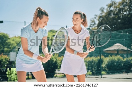 Tennis, sport and women with athlete and coach on outdoor turf, training instructor with fitness motivation and help. Exercise, sports lesson and workout together, teaching and learn skill on court Royalty-Free Stock Photo #2261946127