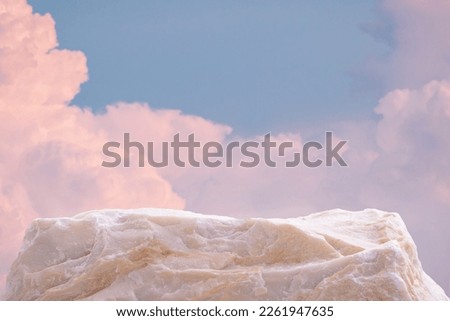 Surreal stone podium table top with outdoor soft pink blue sky pastel cloudscape at sunrise nature background.Beauty cosmetic product placement pedestal display,summer paradise dreamy concept.
