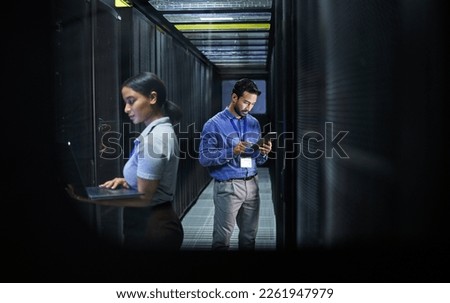 Man, woman or technology in server room, IT engineering or software programming for cybersecurity, analytics or database safety. Data center, programmer or coding developer on cloud, laptop or tablet Royalty-Free Stock Photo #2261947979