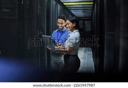 Server room, laptop and technician people for software management, system upgrade or cyber security. Teamwork, data center and engineer or programmer employees, information technology and programming Royalty-Free Stock Photo #2261947987