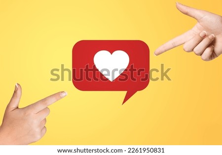 Hand hold a heart sign on background