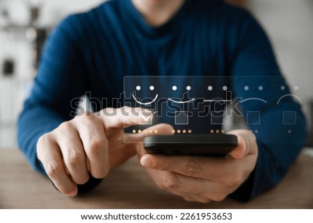 Customer Satisfaction Survey Concept, Users Rate Service Experiences On Online Application, Customers Can Evaluate Quality Of Service Leading To Business Reputation Rating. Royalty-Free Stock Photo #2261953653