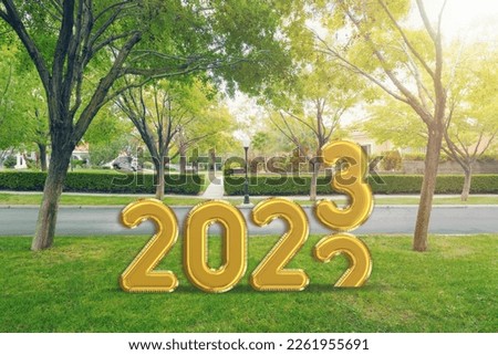 New Year concept, 2023 numbers on forest road.