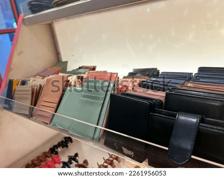 Collection of wallets of various types and various colors.
