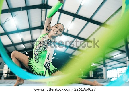 Woman, gymnastics and ribbon portrait in performance training, creative exercise or fitness practice for dynamic art. Smile, happy and rhythmic gymnast, athlete or equipment in dance sports workout