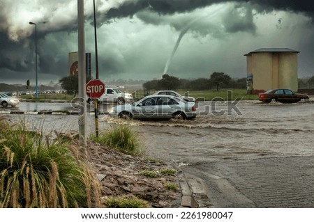 natural disasters global storms with heavy winds and flooded streets, in cities around the world Royalty-Free Stock Photo #2261980047