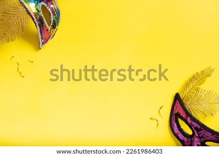 Festive masquerade or carnival background with festive masks with copy space.
