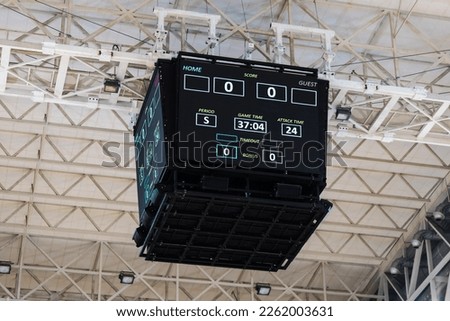 big score board hanging in a sports hall Royalty-Free Stock Photo #2262003631